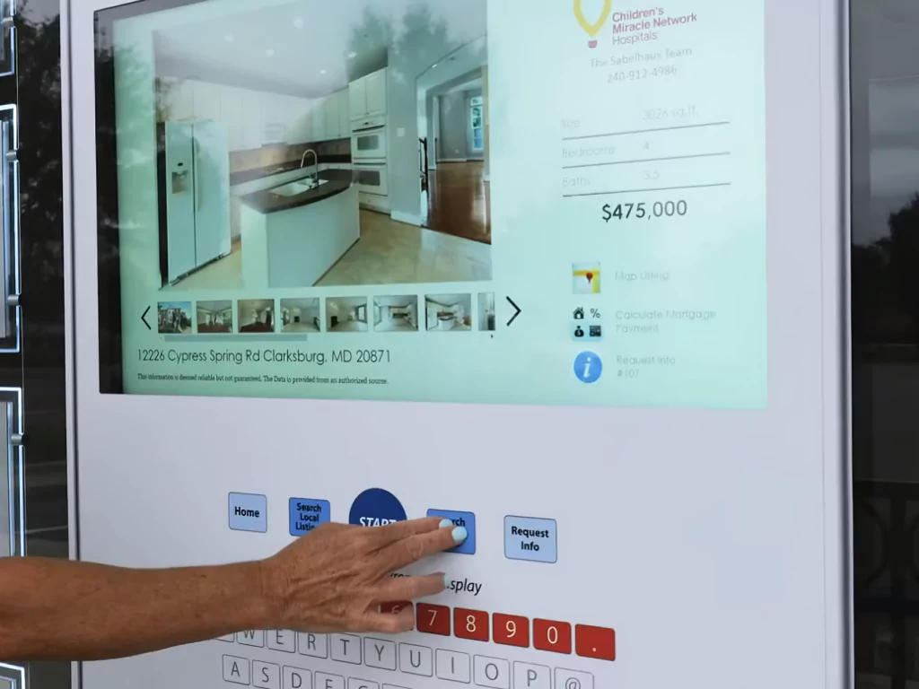 A woman puch the button on the screen